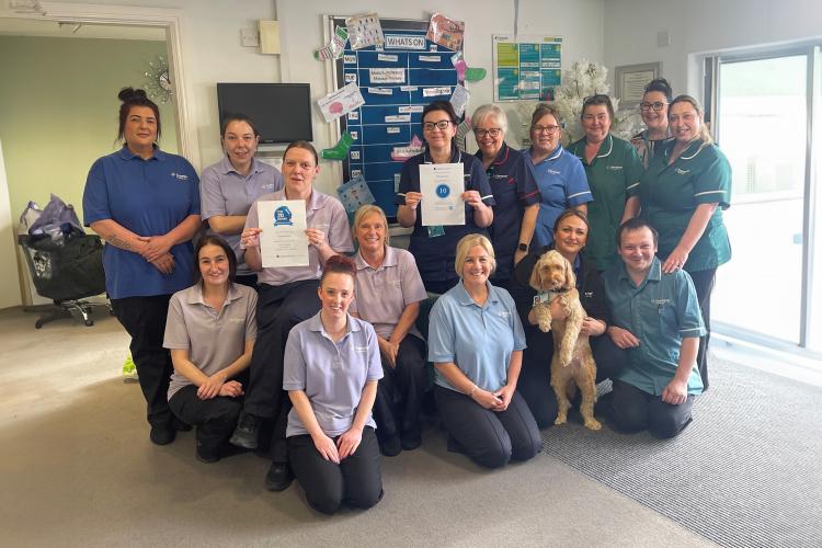 Staff at Dearnevale celebrate their recognition
