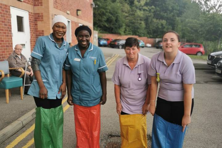 Care workers taking part in sports day